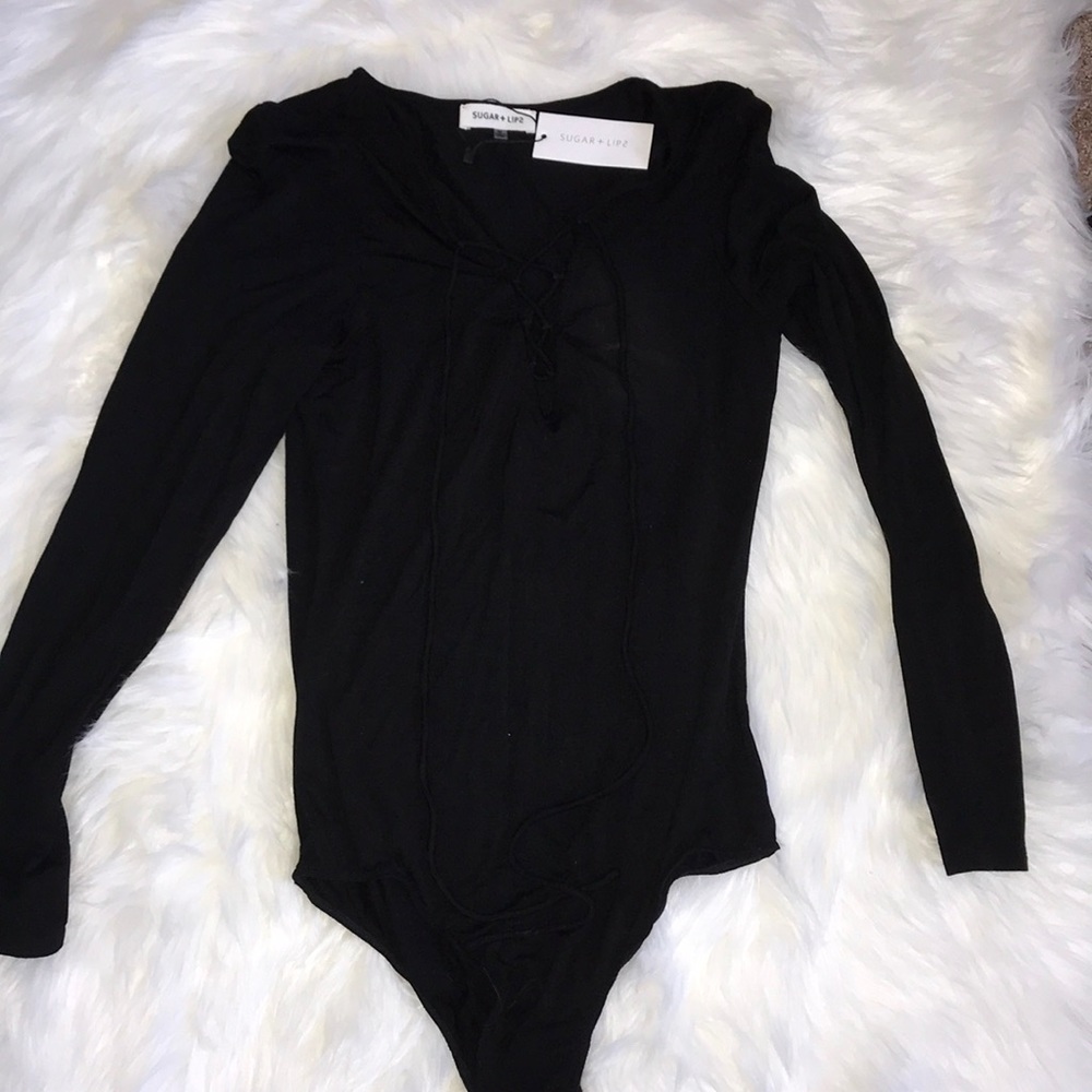 Black lace up body suit (tags still on)